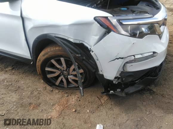 2022 Honda Pilot EX-L z VIN 5FNYF5H50NB005447, wystawiony jako IAAI lot #41953950 z przebiegiem 68 636 mil mil oraz . Historia ofert i sprzedaży dostępna na DreamBid. Obrazek 6.