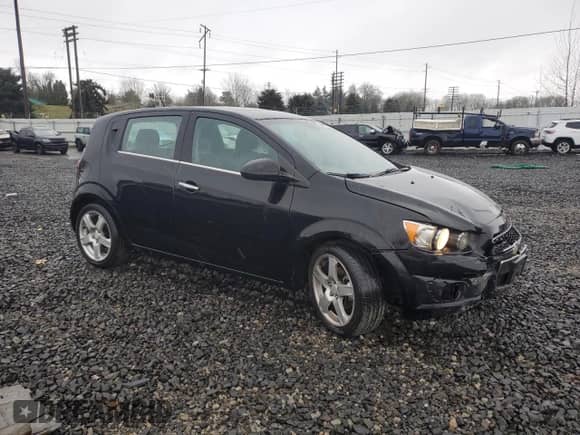 2012 Chevrolet Sonic LTZ with VIN 1G1JE6SH1C4194880, listed as a Copart auction lot 45591325 with 181,967 mi miles and Salvage title. Bid and sale history available at DreamBid. Image 4.