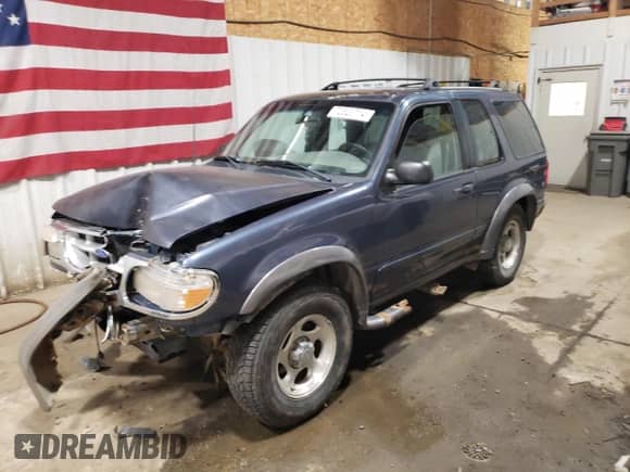 1999 Ford Explorer Sport с VIN 1FMYU24E5XUC26073, выставлен на аукционе Copart как лот 86696925 с пробегом 179 188 миль миль и На запчасти • Non repairable. История ставок и продаж доступна на DreamBid. Изображение 1.