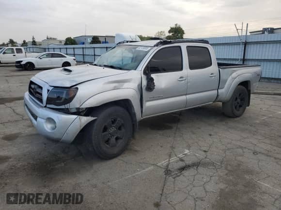 2008 Toyota Tacoma PreRunner with VIN 3TMKU72N98M015846, listed as a Copart auction lot 82139065 with 210,053 mi miles and Salvage title. Bid and sale history available at DreamBid. Image 1.