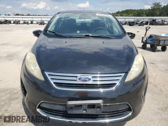 2011 Ford Fiesta SE z VIN 3FADP4BJXBM148155, wystawiony jako Copart lot #81632945 z przebiegiem 236 903 mil mil oraz Szkoda całkowita • Salvage title. Historia ofert i sprzedaży dostępna na DreamBid. Obrazek 5.