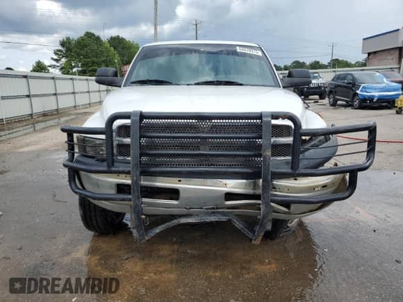 2000 Dodge 2500 with VIN 3B7KF2363YG114309, listed as a Copart auction lot 60270975 with 214,660 mi miles and Salvage title. Bid and sale history available at DreamBid. Image 5.