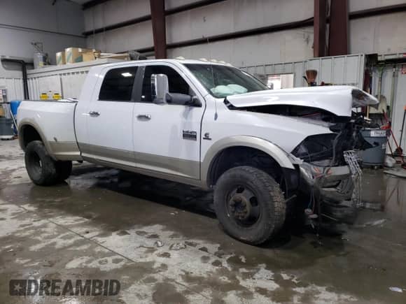 2010 Dodge 3500 Laramie with VIN 3D73Y4HL7AG193326, listed as a Copart auction lot 87431914 with 301,272 mi miles and Salvage title. Bid and sale history available at DreamBid. Image 4.