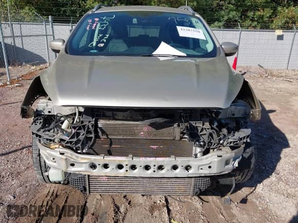 2017 Ford Escape Titanium with VIN 1FMCU9J95HUD42000, listed as a IAAI auction lot 43387558 with 122,185 mi miles and . Bid and sale history available at DreamBid. Image 13.