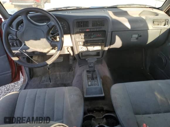1995 Nissan Frontier XE with VIN 1N6HD16S9SC448984, listed as a Copart auction lot 72807634 with 244,726 mi miles and Salvage title. Bid and sale history available at DreamBid. Image 8.