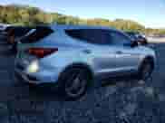 2017 Hyundai Santa Fe 2.4L с VIN 5XYZTDLBXHG403945, выставлен на аукционе Copart как лот 82372095 с пробегом 114 649 миль миль и Списание • Salvage title. История ставок и продаж доступна на DreamBid. Изображение 3.