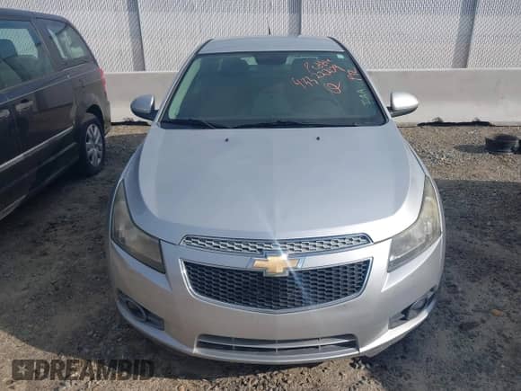 2012 Chevrolet Cruze 1LT z VIN 1G1PF5SC5C7358328, wystawiony jako IAAI lot #43322209 z przebiegiem 121 450 mil mil oraz . Historia ofert i sprzedaży dostępna na DreamBid. Obrazek 6.