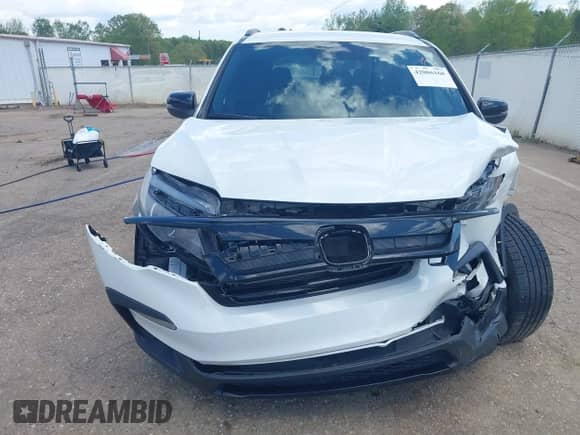 2022 Honda Pilot Sport with VIN 5FNYF5H33NB017719, listed as a IAAI auction lot 42006168 with 67,749 mi miles and . Bid and sale history available at DreamBid. Image 6.