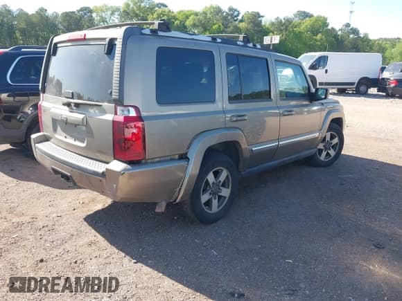 2006 Jeep Commander with VIN 1J8HH48N76C293897, listed as a IAAI auction lot 42021253 with 214,412 mi miles and . Bid and sale history available at DreamBid. Image 4.