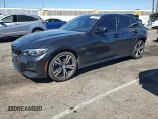 2022 BMW 3 Series 330e с VIN 3MW5P7J08N8C52016, выставлен на аукционе Copart как лот 71670335 с пробегом 34 644 миль миль и Списание • Salvage title. История ставок и продаж доступна на DreamBid. Изображение 1.