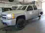 2010 Chevrolet Silverado 1500 LTZ with VIN 3GCRKTE31AG209461, listed as a Copart auction lot 70687705 with 187,064 mi miles and Salvage title. Bid and sale history available at DreamBid. Image 1.