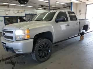 2010 Chevrolet Silverado 1500 LTZ with VIN 3GCRKTE31AG209461, listed as a Copart auction lot 70687705 with 187,064 mi miles and Salvage title. Bid and sale history available at DreamBid. Image 1.