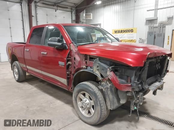 2010 Dodge 2500 ST with VIN 3D7TT2CT5AG148198, listed as a IAAI auction lot 42400809 with 196,031 mi miles and . Bid and sale history available at DreamBid. Image 1.