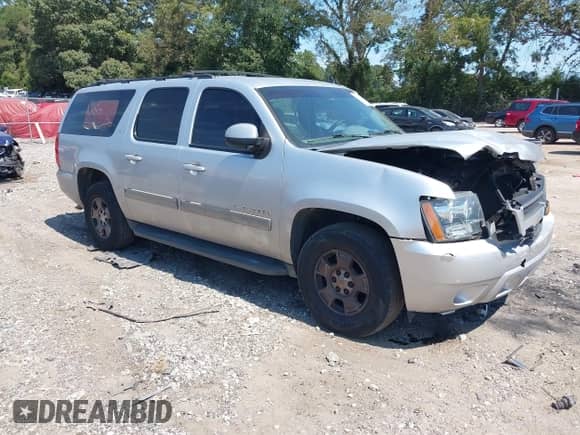2012 Chevrolet Suburban LT z VIN 1GNSCJE00CR200110, wystawiony jako IAAI lot #43203453 z przebiegiem 200 000 mil mil oraz . Historia ofert i sprzedaży dostępna na DreamBid. Obrazek 1.