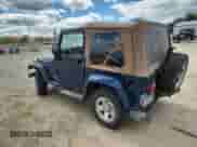 2003 Jeep Wrangler X z VIN 1J4FA39S33P356428, wystawiony jako Copart lot #70285135 z przebiegiem 147 788 mil mil oraz Szkoda całkowita • Salvage title. Historia ofert i sprzedaży dostępna na DreamBid. Obrazek 2.