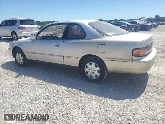 1994 Toyota Camry LE z VIN 4T1SK12C2RU352689, wystawiony jako Copart lot #62940695 z przebiegiem 255 237 mil mil oraz Szkoda całkowita • Salvage title. Historia ofert i sprzedaży dostępna na DreamBid. Obrazek 2.
