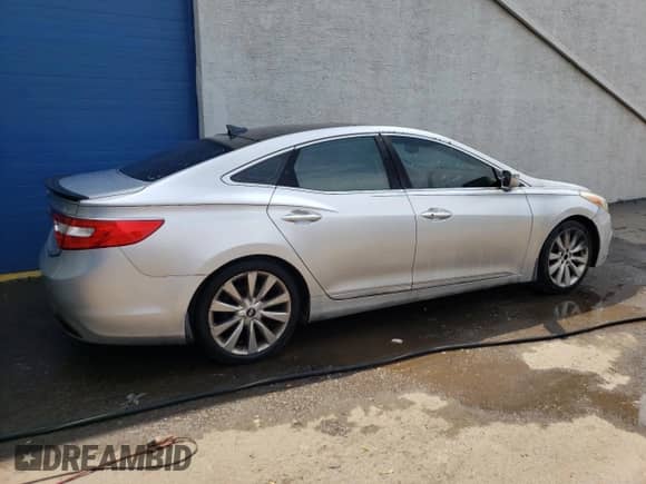 2012 Hyundai Azera с VIN KMHFH4JG3CA192496, выставлен на аукционе Copart как лот 64794034 с пробегом 130 211 миль миль и Чистый • Clean title. История ставок и продаж доступна на DreamBid. Изображение 3.