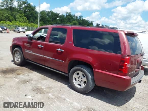 2009 Chevrolet Suburban LTZ z VIN 1GNFK36379J124126, wystawiony jako IAAI lot #42564602 z przebiegiem 210 343 mil mil oraz . Historia ofert i sprzedaży dostępna na DreamBid. Obrazek 14.