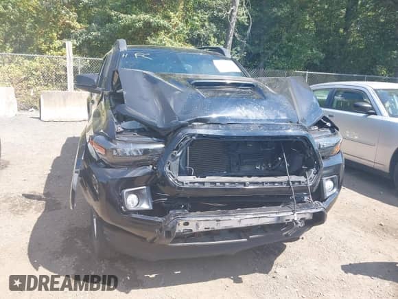 2018 Toyota Tacoma SR z VIN 3TMCZ5AN0JM134886, wystawiony jako IAAI lot #43135443 z przebiegiem 76 704 mil mil oraz . Historia ofert i sprzedaży dostępna na DreamBid. Obrazek 10.