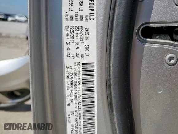 2014 Dodge Journey SXT with VIN 3C4PDCBB8ET104555, listed as a Copart auction lot 71114395 with 257,468 mi miles and Salvage title. Bid and sale history available at DreamBid. Image 14.