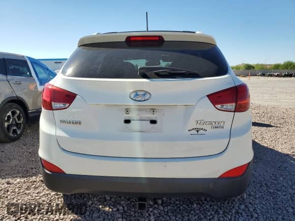 2011 Hyundai Tucson Limited with VIN KM8JU3AC7BU222304, listed as a Copart auction lot 71310104 with 118,726 mi miles and Salvage title. Bid and sale history available at DreamBid. Image 6.