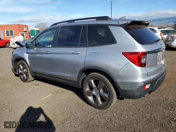 2020 Honda Passport Touring with VIN 5FNYF7H95LB006508, listed as a Copart auction lot 82423674 with 29,751 mi miles and Salvage title. Bid and sale history available at DreamBid. Image 2.