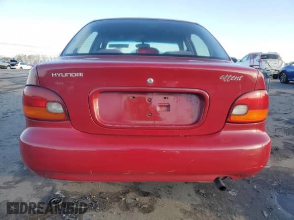 1997 Hyundai Accent GL z VIN KMHVF24N9VU356190, wystawiony jako Copart lot #85610774 z przebiegiem 91 707 mil mil oraz Czysty tytuł • Clean title. Historia ofert i sprzedaży dostępna na DreamBid. Obrazek 6.