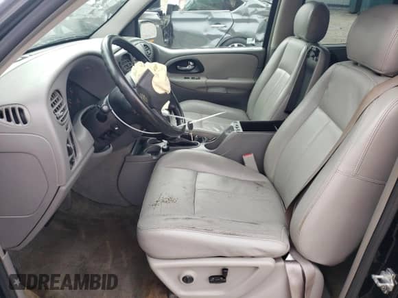 2005 Chevrolet TrailBlazer LT with VIN 1GNES16SX56148697, listed as a Copart auction lot 60306255 with 170,616 mi miles and Salvage title. Bid and sale history available at DreamBid. Image 7.