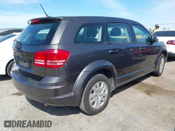 2014 Dodge Journey American Value with VIN 3C4PDCAB4ET194160, listed as a IAAI auction lot 43145793 with 194,266 mi miles and . Bid and sale history available at DreamBid. Image 4.