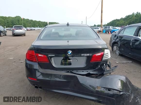 2014 BMW 5 Series 528i xDrive with VIN WBA5A7C50ED615857, listed as a IAAI auction lot 42926355 with 131,175 mi miles and . Bid and sale history available at DreamBid. Image 16.
