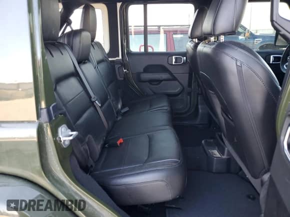 2021 Jeep Wrangler Unlimited Sahara Altitude z VIN 1C4HJXEN8MW736426, wystawiony jako Copart lot #50145245 z przebiegiem 30 938 mil mil oraz Szkoda całkowita • Salvage title. Historia ofert i sprzedaży dostępna na DreamBid. Obrazek 11.