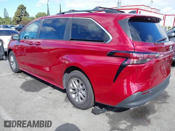2022 Toyota Sienna LE with VIN 5TDKRKEC7NS096484, listed as a IAAI auction lot 43357285 with 68,794 mi miles and . Bid and sale history available at DreamBid. Image 3.