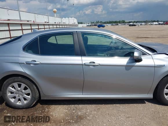 2021 Toyota Camry Hybrid LE with VIN 4T1C31AK3MU549454, listed as a IAAI auction lot 43138660 with 144,272 mi miles and . Bid and sale history available at DreamBid. Image 13.