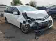 2018 Toyota Sienna XLE with VIN 5TDDZ3DC9JS207675, listed as a Copart auction lot 67487915 with 66,617 mi miles and Salvage title. Bid and sale history available at DreamBid. Image 4.