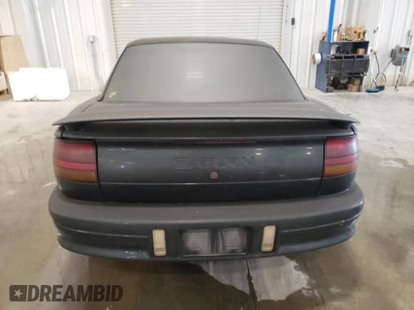 1996 Saturn SC with VIN 1G8ZF1280TZ139117, listed as a Copart auction lot 73220274 with Not provided miles and Salvage title. Bid and sale history available at DreamBid. Image 6.
