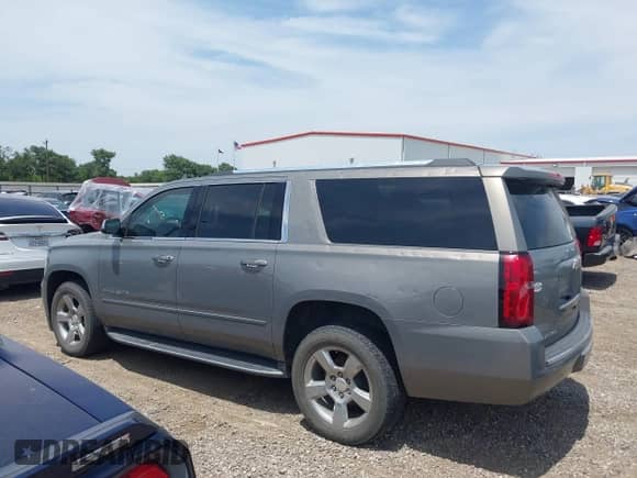 2019 Chevrolet Suburban Premier with VIN 1GNSCJKC9KR264210, listed as a IAAI auction lot 42238540 with 53,256 mi miles and . Bid and sale history available at DreamBid. Image 15.