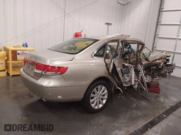 2009 Hyundai Azera GLS z VIN KMHFC46D39A360840, wystawiony jako IAAI lot #41441715 z przebiegiem 59 991 mil mil oraz . Historia ofert i sprzedaży dostępna na DreamBid. Obrazek 4.