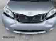 2015 Toyota Sienna L with VIN 5TDZK3DCXFS607178, listed as a IAAI auction lot 42868518 with 318,805 mi miles and . Bid and sale history available at DreamBid. Image 6.