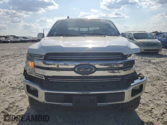 2020 Ford F-150 XLT z VIN 1FTEW1E44LFB75309, wystawiony jako Copart lot #71110255 z przebiegiem 99 285 mil mil oraz Szkoda całkowita • Salvage title. Historia ofert i sprzedaży dostępna na DreamBid. Obrazek 5.