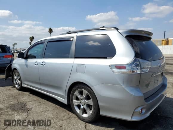 2014 Toyota Sienna SE with VIN 5TDXK3DC2ES493392, listed as a Copart auction lot 71921465 with 137,316 mi miles and Salvage title. Bid and sale history available at DreamBid. Image 2.