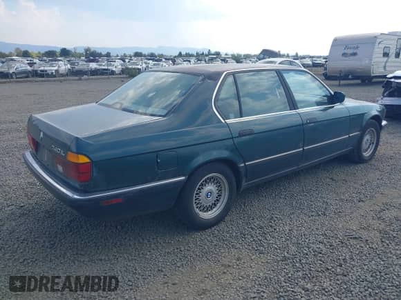 1993 BMW 7 Series with VIN WBAGD8326PDE86850, listed as a IAAI auction lot 43045787 with Not provided miles and . Bid and sale history available at DreamBid. Image 4.