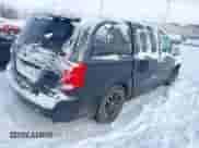 2014 Dodge Grand Caravan SXT with VIN 2C4RDGBG1ER420765, listed as a IAAI auction lot 40986661 with 167,365 mi miles and . Bid and sale history available at DreamBid. Image 4.