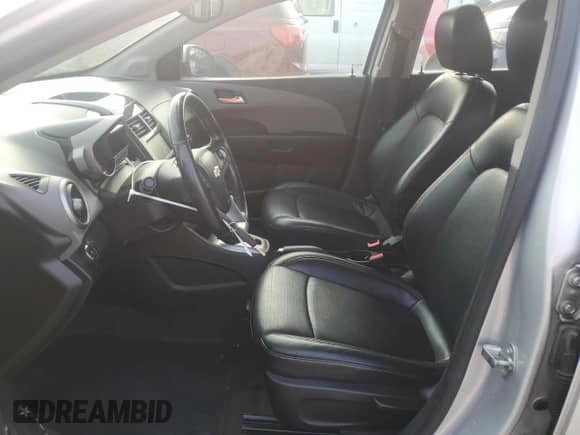2015 Chevrolet Sonic LTZ with VIN 1G1JE6SB4F4208996, listed as a Copart auction lot 65555385 with 76,714 mi miles and Salvage title. Bid and sale history available at DreamBid. Image 7.