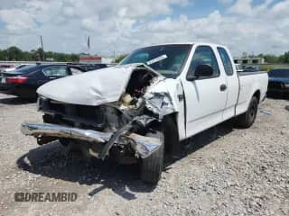 1999 Ford F-150 с VIN 1FTRX17W0XNA29840, выставлен на аукционе Copart как лот 63070535 с пробегом Не указан миль и Списание • Salvage title. История ставок и продаж доступна на DreamBid. Изображение 1.