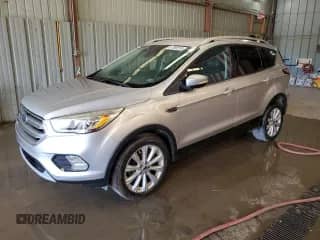 2017 Ford Escape Titanium с VIN 1FMCU9J95HUA02877, выставлен на аукционе Copart как лот 81366515 с пробегом 166 622 миль миль и Чистый • Clean title. История ставок и продаж доступна на DreamBid. Изображение 1.