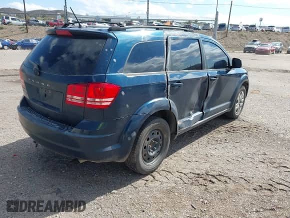 2014 Dodge Journey American Value with VIN 3C4PDCAB8ET112463, listed as a IAAI auction lot 43434948 with 138,754 mi miles and . Bid and sale history available at DreamBid. Image 4.