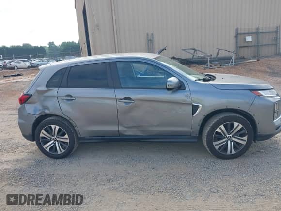 2021 Mitsubishi Outlander ES z VIN JA4ARUAU0MU022933, wystawiony jako IAAI lot #42848396 z przebiegiem 62 789 mil mil oraz . Historia ofert i sprzedaży dostępna na DreamBid. Obrazek 13.