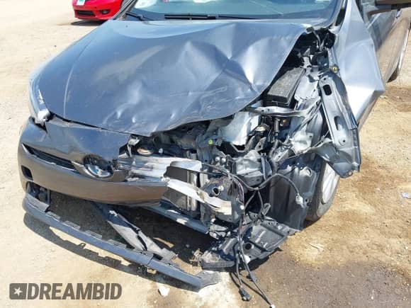 2022 Toyota Prius L Eco with VIN JTDKAMFU5N3160758, listed as a IAAI auction lot 42699871 with 64,403 mi miles and . Bid and sale history available at DreamBid. Image 6.