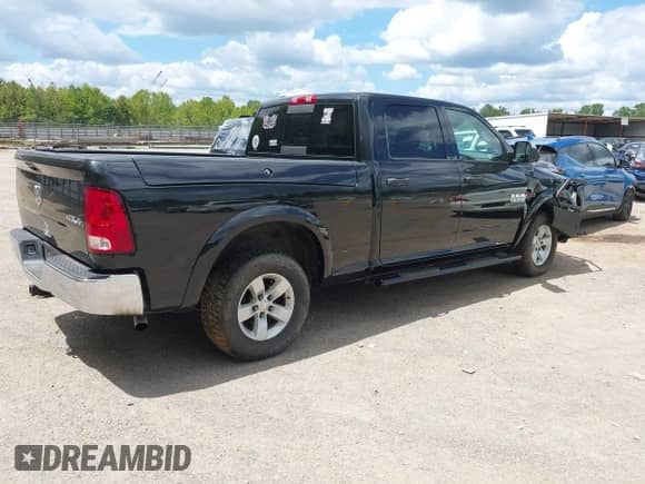 2016 Ram 1500 Outdoorsman z VIN 1C6RR7TM4GS335448, wystawiony jako IAAI lot #42815664 z przebiegiem 128 449 mil mil oraz . Historia ofert i sprzedaży dostępna na DreamBid. Obrazek 4.