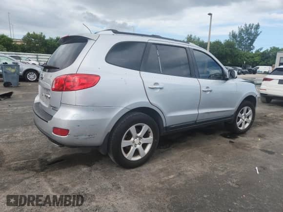 2009 Hyundai Santa Fe Limited с VIN 5NMSH73E39H282276, выставлен на аукционе Copart как лот 69031855 с пробегом 216 419 миль миль и Списание • Salvage title. История ставок и продаж доступна на DreamBid. Изображение 3.